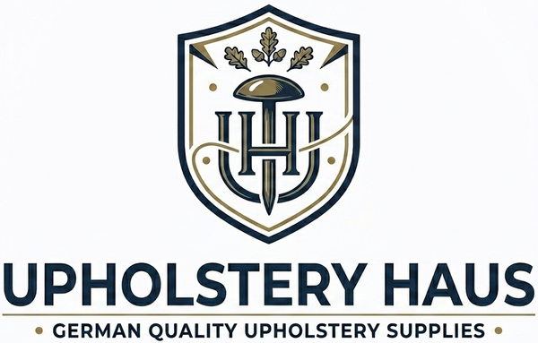 Logo of Upholstery Haus with a shield design on a white background